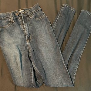 Fashion Nova dark wash skinny jeans.